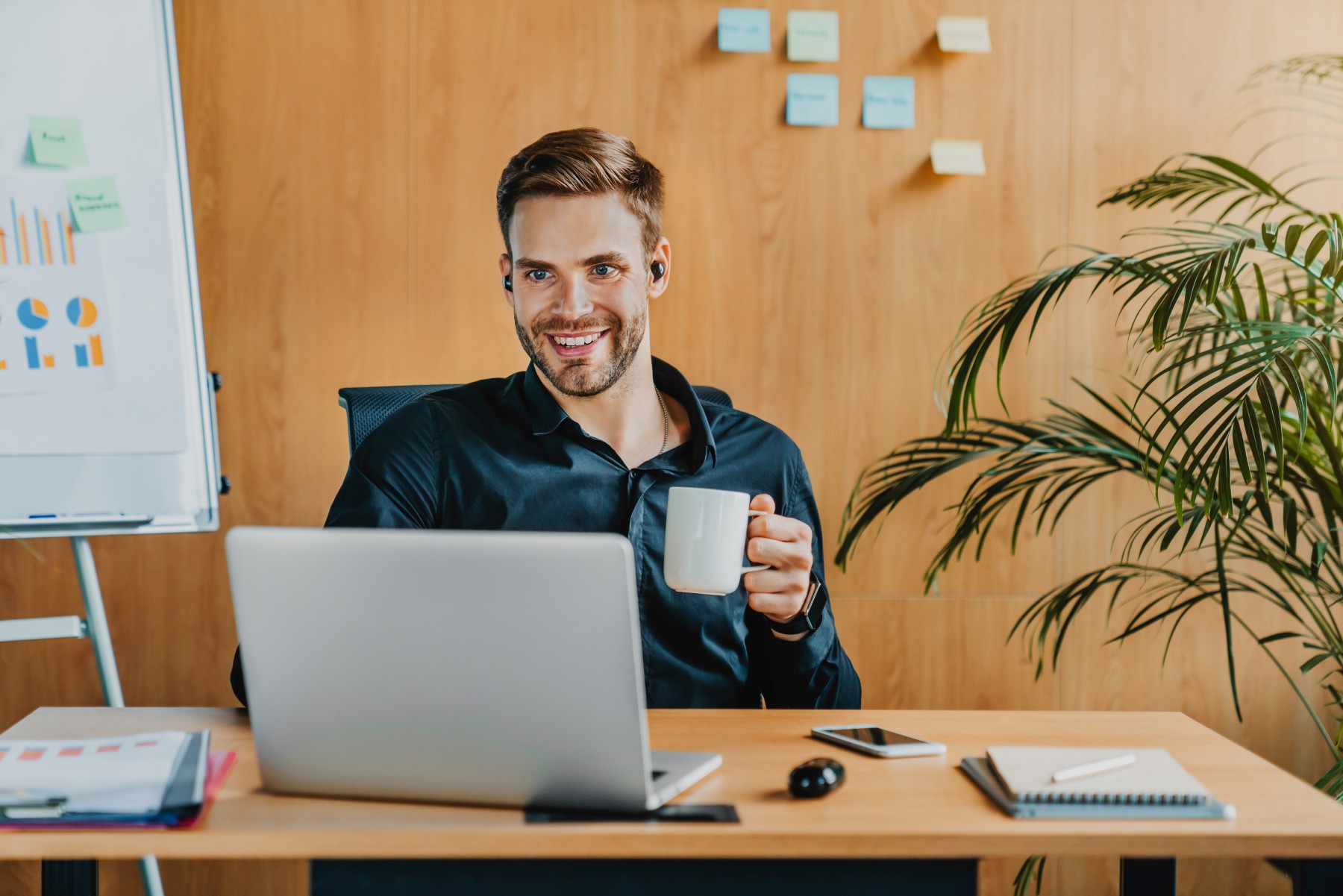 cheerful caucasian man working with laptop and wir 2023 11 27 04 46 23 utc 1 1