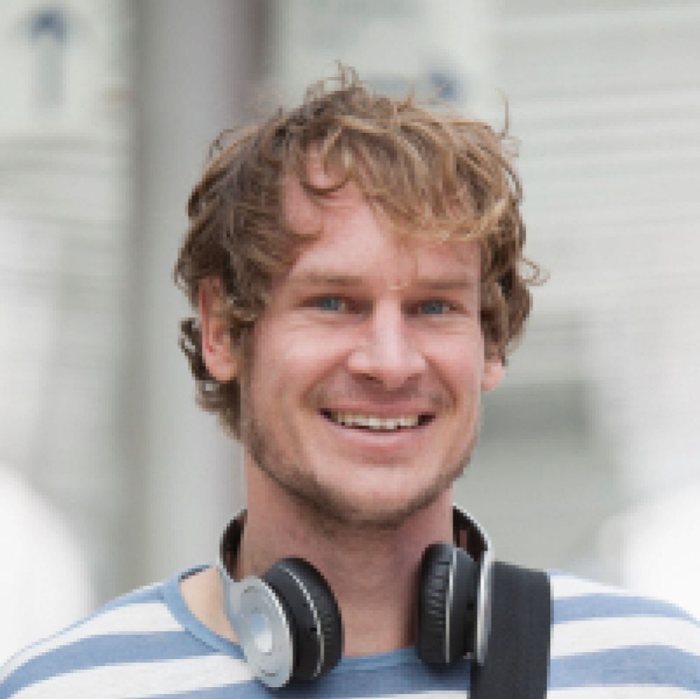 portrait of smiling man with headphones and should PFC5HDP 1 1 1